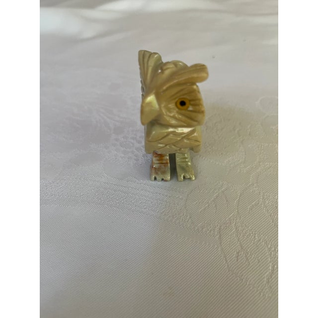A beautifully carved owl figurine, a cherished member of our stone animal figurine collection. Purchased from a gallery in...