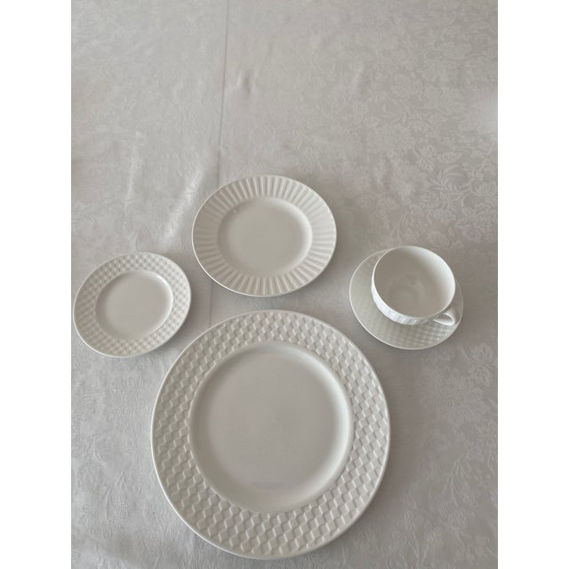Late 20th Century Wedgwood Night and Day White Bone China Seven Five Piece Place Settings Made in England. The set...