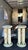 These Mid-Century Modern Onyx Triple Cylinder Base Side Tables stand at a height of 27 inches, featuring a sleek and...