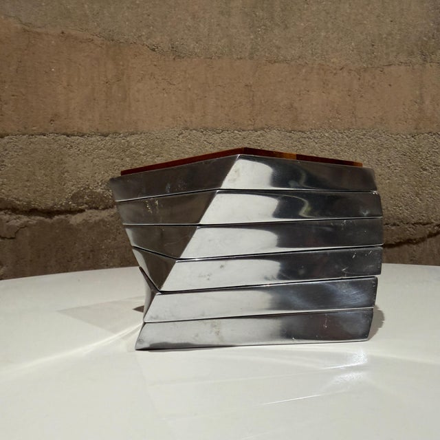 For your consideration, a Nambé Twist Coaster Set, a sophisticated piece of tabletop barware designed by Lou Henry. The...