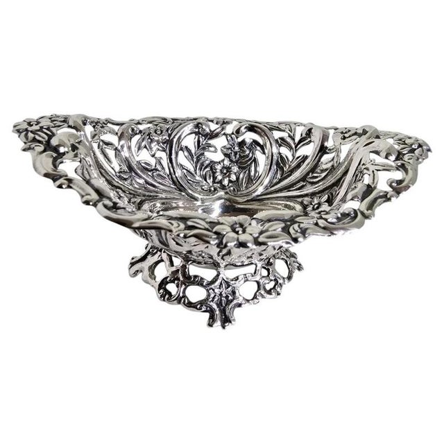 A Victorian sterling silver trinket or bonbon dish by Henry Matthews, hallmarked Birmingham 1894. Of navette or boat-...