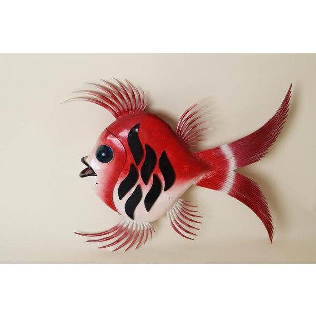 This lamp is like a work of art that graces your wall. And this fish is a light object that adds a touch of whimsy to your...