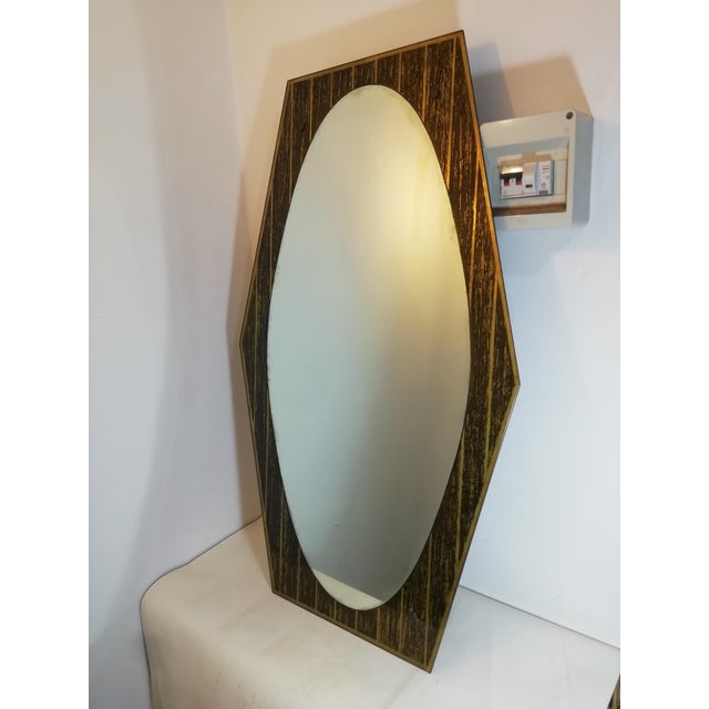 Beautiful original vintage mirror, made in Italy. Hexagonal in shape, it features a central oval mirror, with a glass...