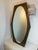 Beautiful original vintage mirror, made in Italy. Hexagonal in shape, it features a central oval mirror, with a glass...
