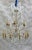 An exceptional Bagués chandelier from the 1960s, crafted from gilded wrought iron and inspired by elegant 18th-century...