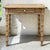 A delightful French 19th century table crafted from stripped pine and richly detailed with carved faux bamboo. The bamboo...