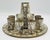 Elegant mid-century Mexican serving set featuring a round tray, water pitcher, and eight matching cups, crafted in solid...