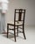 This piece presents as a dining chair, distinguished by dark walnut with inlaid marquetry floral. Dating to 19th Century...