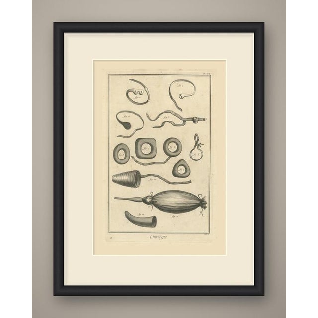 An original antique copper engraving, uncolored, presenting appliances in twelve numbered figures. Across the top are four...