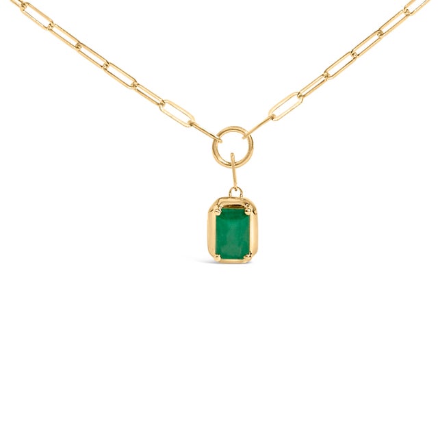 Envelop your neckline in the timeless elegance of our solitaire pendant necklace, an exquisite synthesis of classic...
