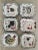 Great set of six whimsical hand-painted plates featuring cows, a rooster, a cat, and a rabbit, all signed by the...
