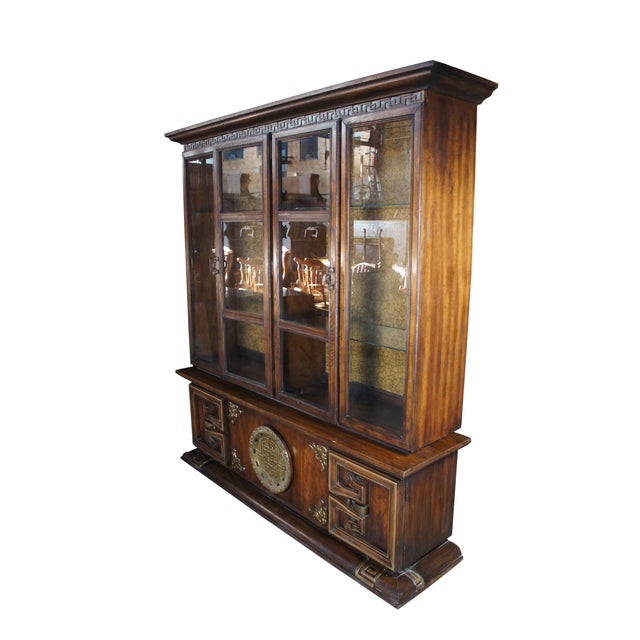 Vintage Ming style China display cabinet / cupboard / credenza by Jessup Furniture Company. Made of oak featuring a large...