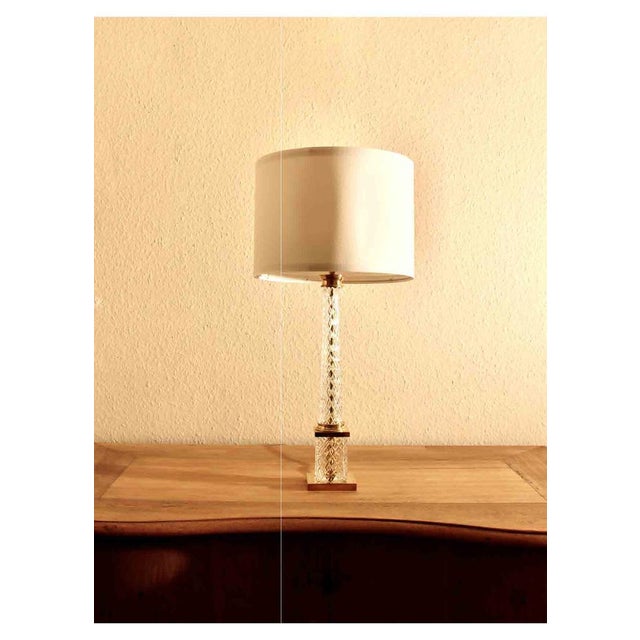 An exquisite French Art Deco table lamp dating from the 1920s–1930s, featuring a square base and column-style design with...