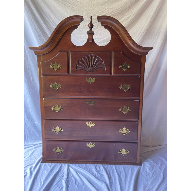 A stunning traditional solid cherry wood chest of drawers from the "American Craftsman Collection" by Stanley Furniture....