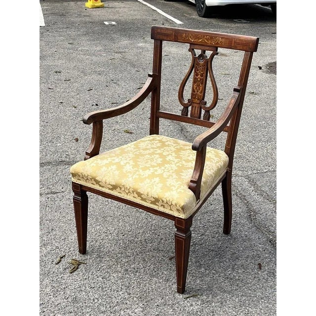 Antique Sheraton inlaid mahogany armchair. Superb quality. Strong and sturdy, is a used item so will have signs of use and...