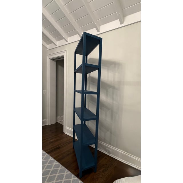 The Jake 32" bookcase by Made Goods is handcrafted in faux true navy Belgian linen. The Jake combines clean architectural...