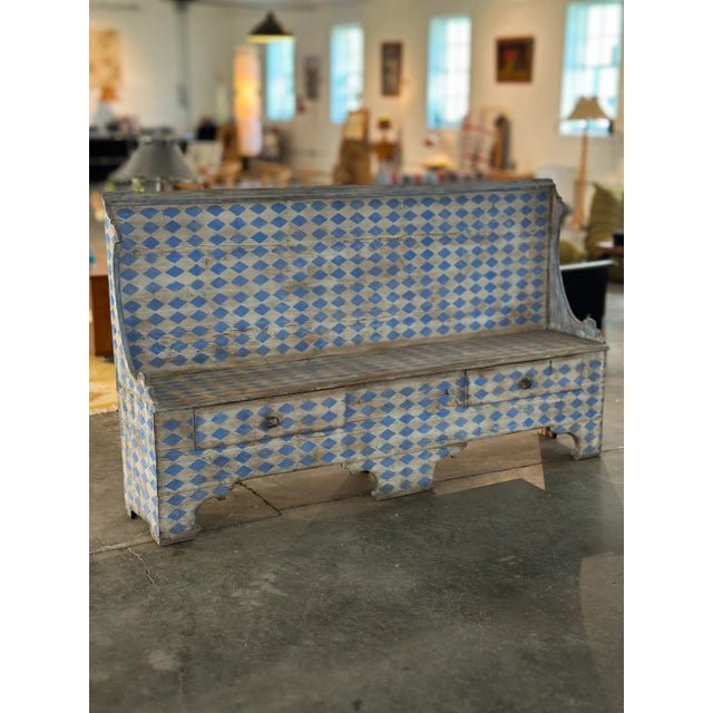 An Italian 19th century painted wooden bench (formerly used as a church pew) featuring a tall backrest and two working...