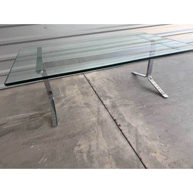 Table is in good condition. Flat chrome plated steel.