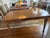 A beautifully proportioned vintage Tomlinson dining table, showcasing the brand’s hallmark craftsmanship and timeless...