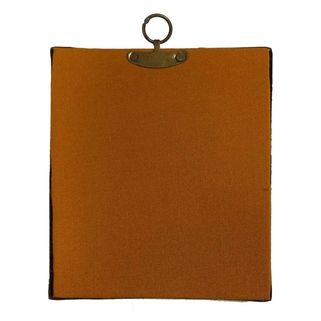 Reproduction oil painting reproduction prints behind glass in antique-look embossed brass frames. Authentic-looking decor...