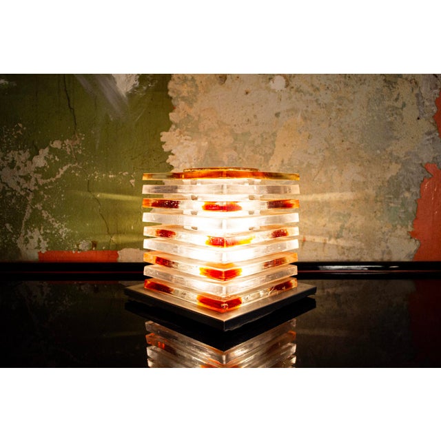 Murano glass table lamp on a chromed metal base. Designer Albano Poli Manufacturer Poliarte 1970s I have official proof of...