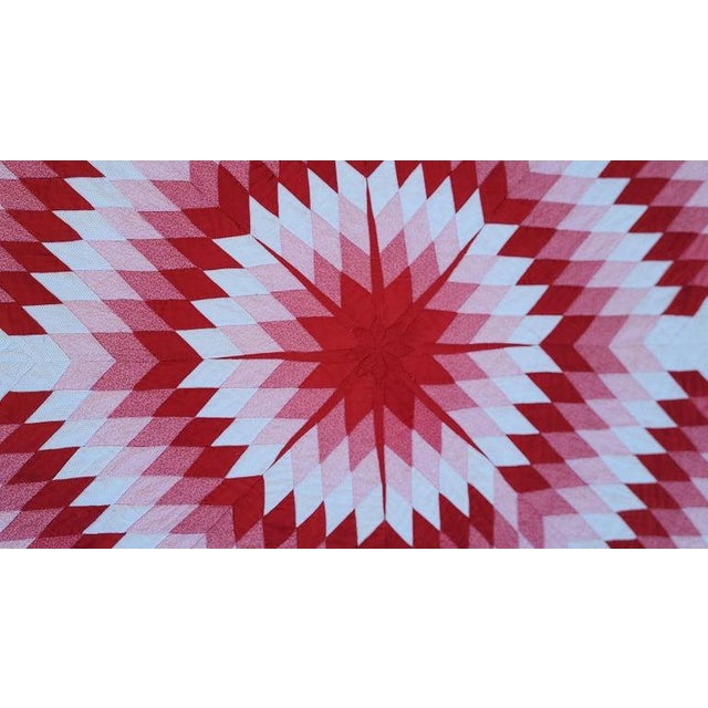 Early 20th century Eight Point Stars quilt with center mariners compass. beautiful red and white color pallet. floating...