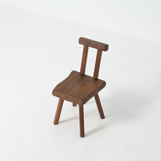 This strong robust chair is handcrafted from dark-colored oak wood. It will bring a natural, bucolic feel to your...