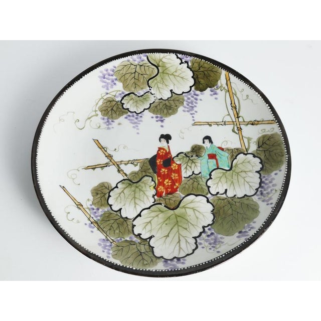 Meiji Hand-Painted Kutani Porcelain Charger with Women and Vine Arbor, 1920s For Sale - Image 6 of 18