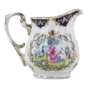 Elegant Victorian Porcelain Creamer With Ornate Blue and Gold Floral Design
