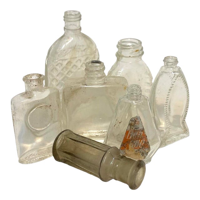 Early 20th Century Clear Glass Miniature Bottle Set of 7 For Sale