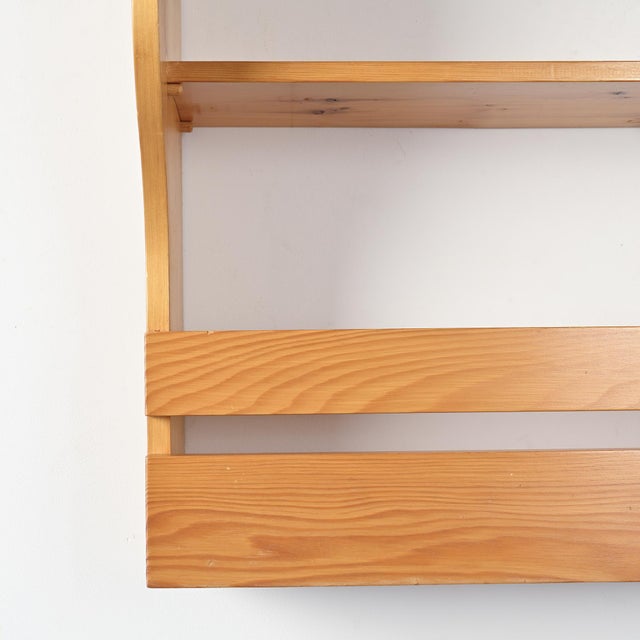 Solid pine wall-mounted sideboard from the furniture designed for the residences of Les Arcs 1800 in the early 1970s. The...