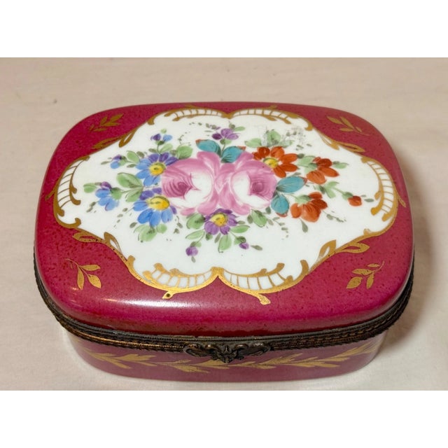 This large antique 19th century hand painted French porcelain dresser box by B. Altman is a stunning piece with a rich red...