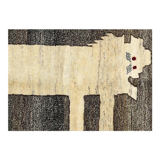 This Shiraz carpet reflects the handicraft of Nomads from the province Fars. Its simple design, the beautiful colours and...