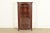 An exceptional antique Victorian, American Empire, or Arts & Crafts bookcase, dining cabinet, or display cabinet By Berkey...