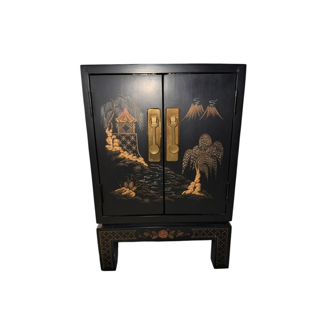 Stunning vintage chinoiserie cabinet on stand in the classic Hollywood Regency / grandmillennial style. Black lacquered...