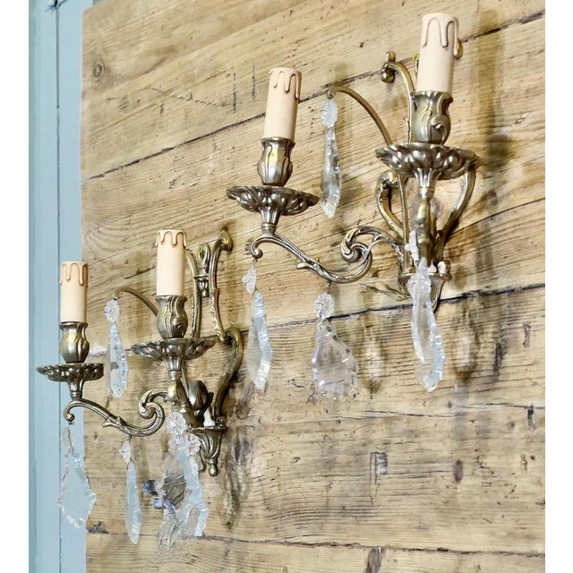 A Pair of Twin Wall Chandeliers, Twin Sconce Wall Lights These are very pretty wall lights, the cast brass sconces are...