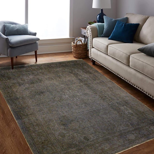 Elevate your home with the timeless beauty of a handmade Persian rug, renowned for its exceptional craftsmanship, rich...