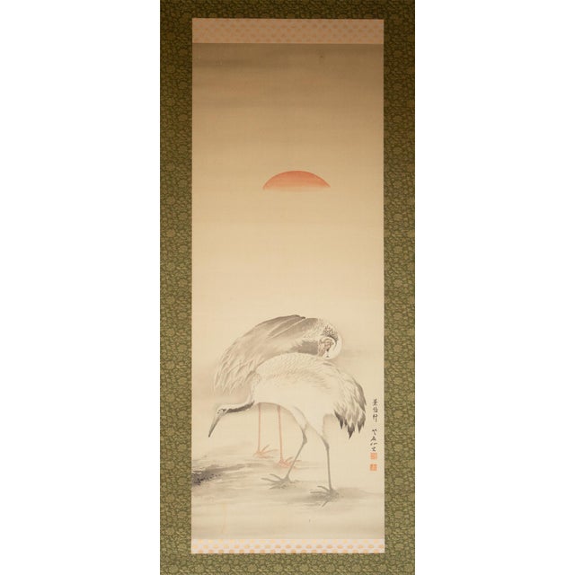 Beautiful Japanese monochrome silk scroll painting depicting two Red-Crowned Cranes under the Sun. Signed and sealed by...