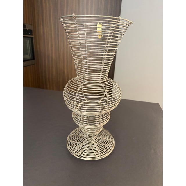 Cappellini "Dal Mondo" – Artificial Flower Centerpiece Designer: Paola Navone The Dal Mondo centerpiece, designed by Paola...