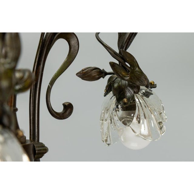 French Art Nouveau Bronze Chandelier with Clear Glass Botanical Shades, 1910 For Sale - Image 13 of 18