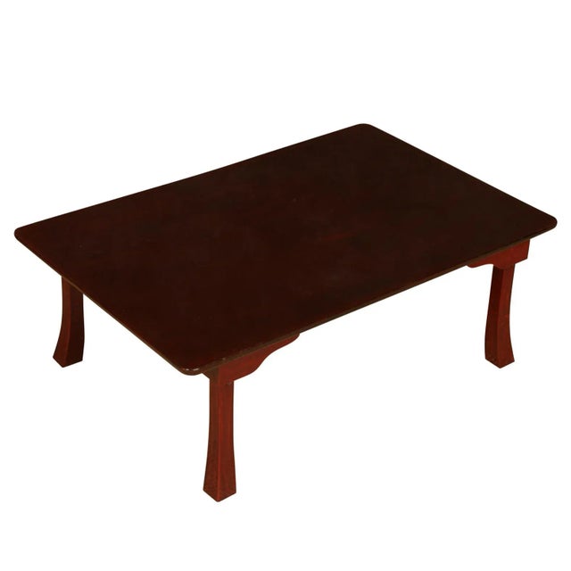 A vintage Asian hardwood low coffee table with high gloss finish to top and shaped legs