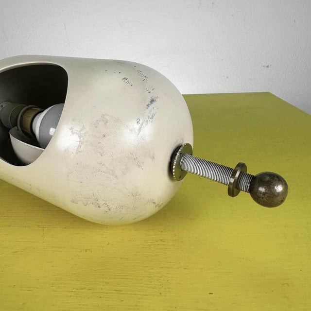 Vintage metal lamp with internal lampshade Height: 24 Diameter: 10.5. This piece is attributed to the mentioned...