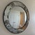RT FACTS Bullseye Mirror Antiqued outer mirror with five rosettes and a clear convex center mirror. A statement mirror in...