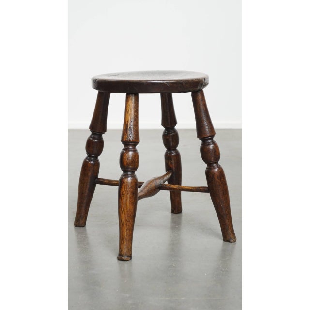 Offered this subtle, elegant and timeless antique English stool/ joint stool from the early 19th century. This cute and...