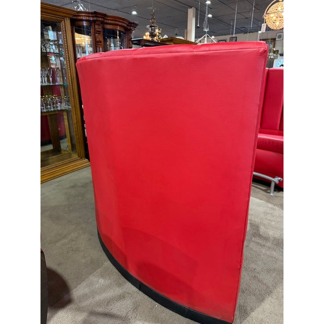 Make a bold statement with this striking red dining booth, a dramatic blend of modern design and luxurious comfort....
