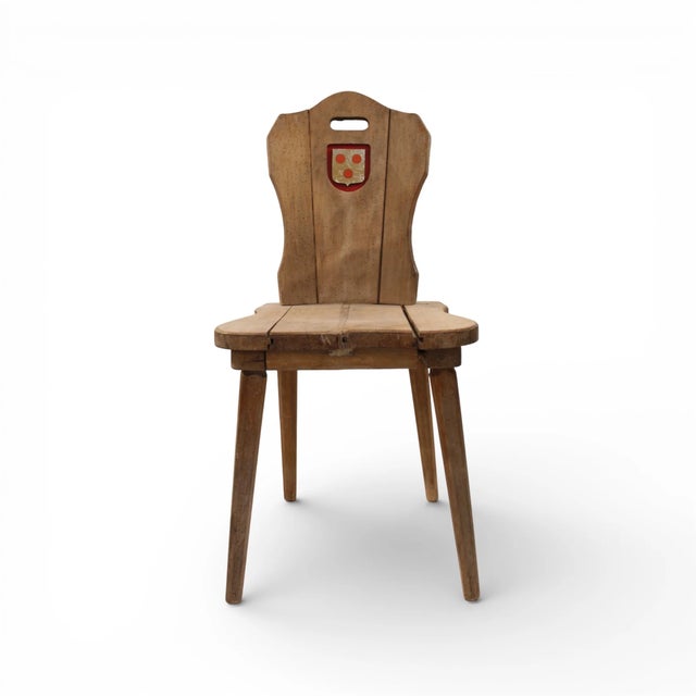 Charming set of 8 wooden chairs with each chair having a unique crest. Exceptional set of eight Belgian wood chairs with...
