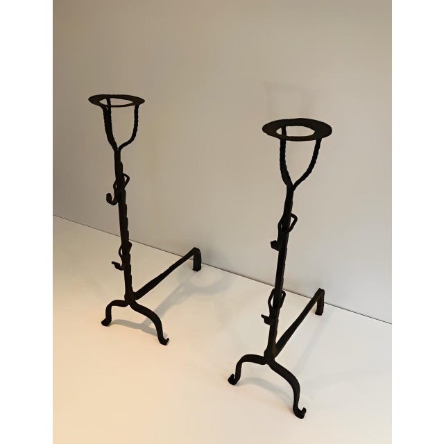 This very nice pair of landiers is made of wrought Iron. This is a very nice and fine French world. 17th Century