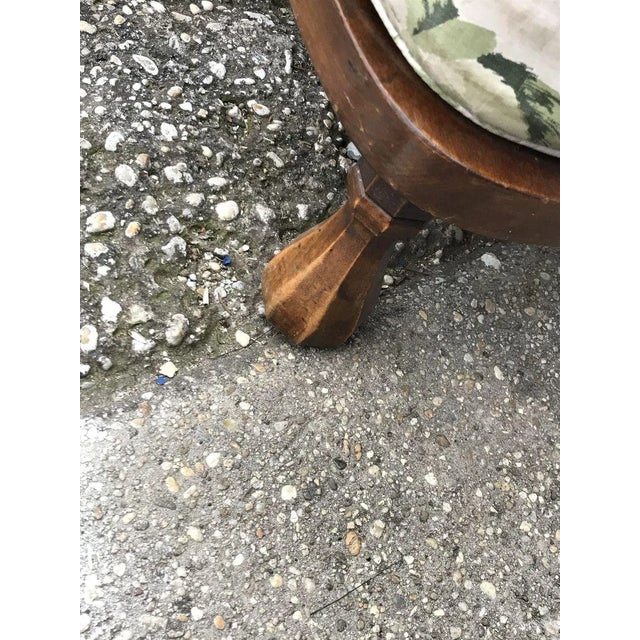 Vintage chair with floral upholstery. Original condition. Mahogany legs.