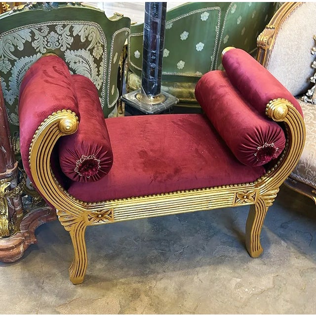 Beautiful details in every part of this piece. Stunning lovely red bench. This is fully refinished in gold leaf and tufted...