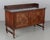A 19th century English marble-topped washstand or sideboard by P. E. Gane. Made of solid and veneer of walnut with highly...